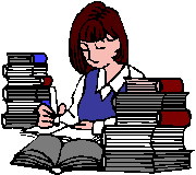 A young lady surrounded with books, reading with highlighter in hand.